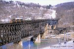 W&LE, Wheeling and Lake Erie SD40s 3048- 3016- 3046, leads a westbound slab train across the Monongahela River at Speers, Pennsylvania. March 4, 2007. 